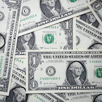 Detailed image of overlapping one dollar bills representing American currency and finance.